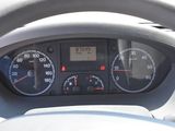 a close up of a car dashboard with a speedometer