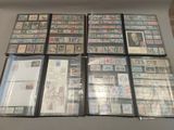 a lot of stamps on a table with a lot of them