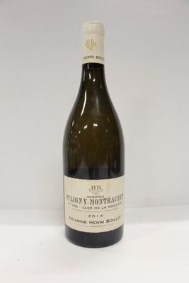 a bottle of wine that is sitting on a table