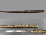 three different types of weapons are displayed on a table