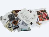 many different types of postcards on a white surface