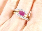 an image of a close up of a person ' s hand with a ring on it