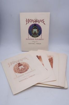 un lot de quatre livres posés sur une table blanche
