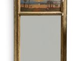 une image représentant un miroir sur lequel est peint un paysage