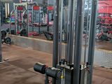 an image of a gym room with a lot of equipment