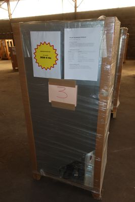 a refrigerator that is wrapped up and ready to be shipped