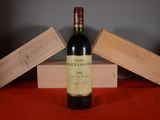 a bottle of wine that is sitting on a table