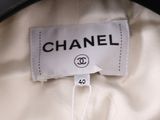 a close up of a chanel label on a dress