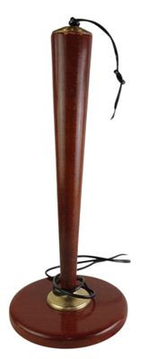 a lamp that is on a wooden stand