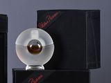 a glass object that is sitting on top of a box