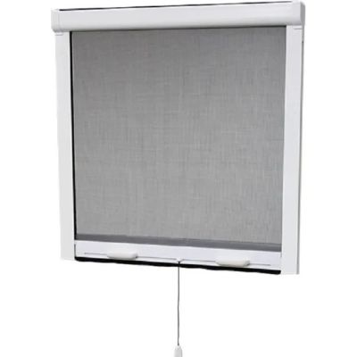 a close up of a window with a white roller shade on it