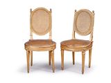 pair of cane back chairs with cane back and cane back
