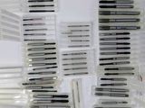 a lot of dental instruments that are in a case