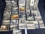 several old black and white photographs of people and buildings