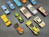 a lot of toy cars that are sitting on a table