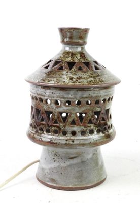 a small lamp that is sitting on a table