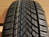 a close up of a tire with a blue stripe on it