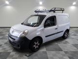 a white van with a roof rack on top of it