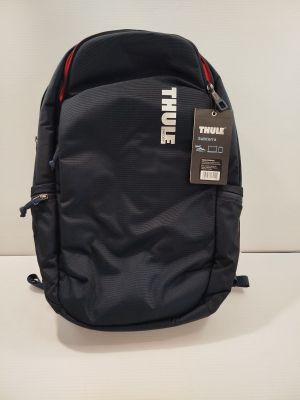 a black backpack that has a tag on it