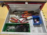 a tool box filled with various tools on the floor