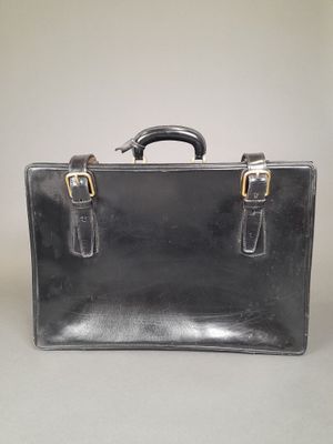 LANCEL, attribué à. Valise semi-rigide à une poignée en cuir…