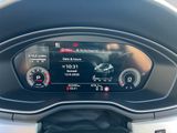 the dashboard of a car with a digital display in the center