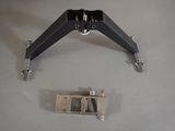a picture of a pair of clamps and a piece of metal