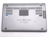 a laptop that is sitting on a white surface