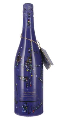 bottle of blue wine with a christmas tree design on it