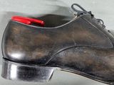 a close up of a pair of shoes on a table