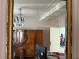 a man taking a picture of himself in a mirror