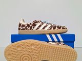 adidas superstar shoes with leopard print on the sole