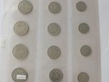 a lot of coins in a plastic bag on a table