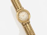 une montre-bracelet pour femme en or 18 carats avec un bracelet tressé