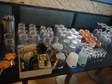 a table with a lot of glasses on it