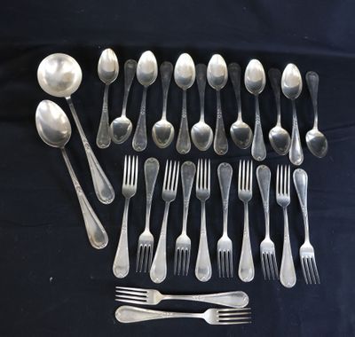 a lot of silver spoons and forks on a table