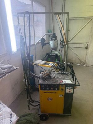 a picture of a room with a table and a work bench