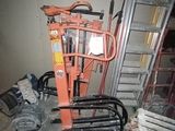a picture of a forklift in a room with a ladder