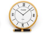 two clocks with roman numerals on each of them