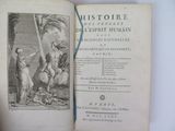 an old book with a picture of a man and a woman on it