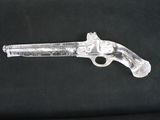 a clear gun with a black background and a black background