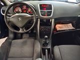 a dashboard of a car with a steering wheel and dashboard controls