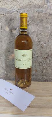 a bottle of wine that is sitting on a table