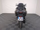 a motorcycle that is parked in a room
