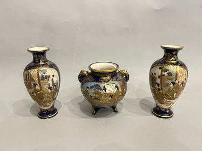 three vases sitting side by side on a white surface