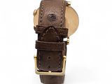 an image of a close up of a watch on a white background