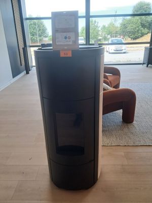 an image of a black stove in a living room