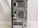 an image of a computer tower with a keyboard and mouse on top of it