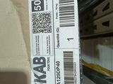 a box with a ticket on it sitting on a shelf