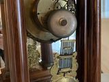 a clock that is sitting on a table in a room
